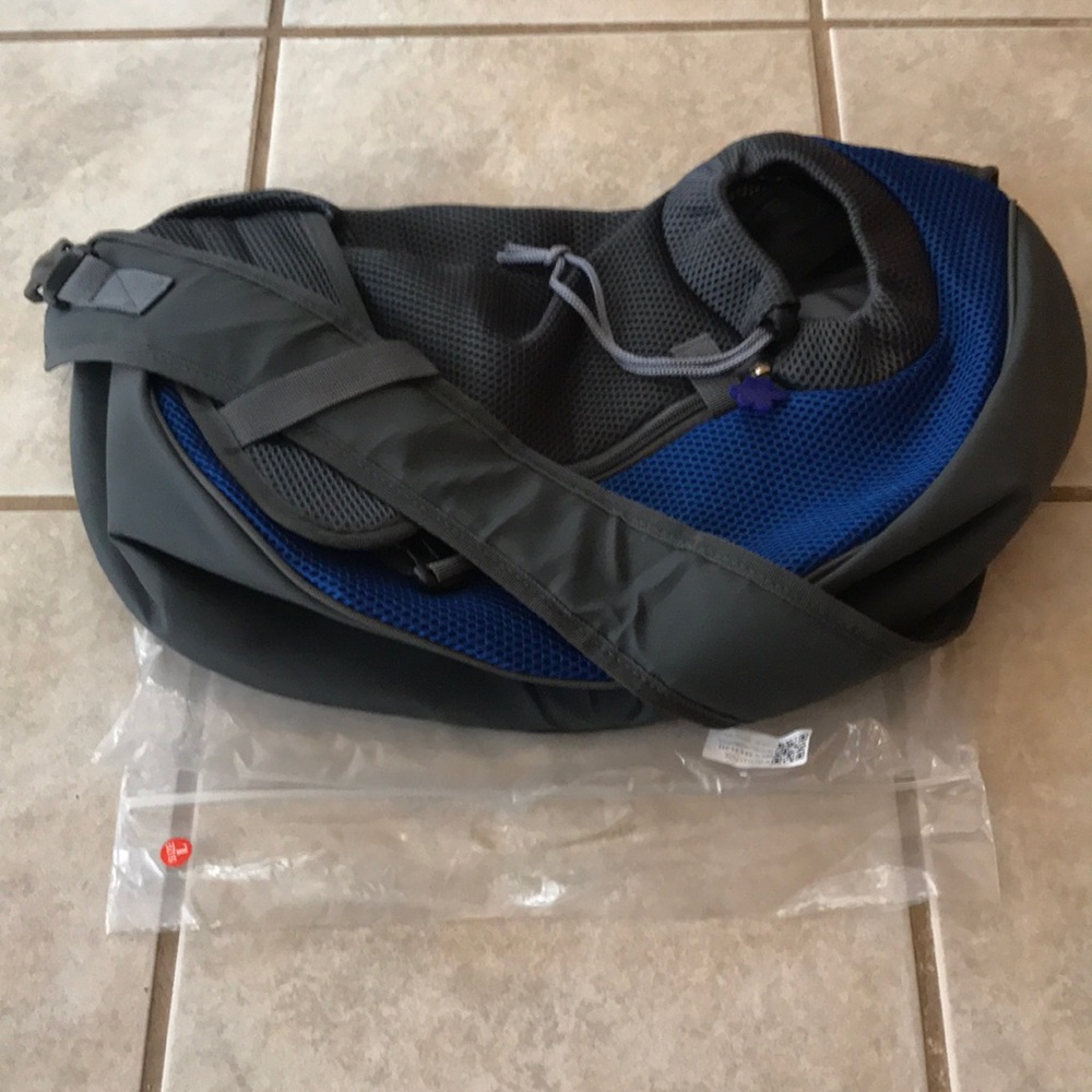 New in bag!! Sling style dog carrier